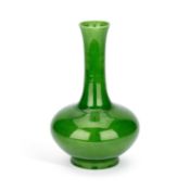 A CHINESE APPLE GREEN-GLAZED BOTTLE VASE