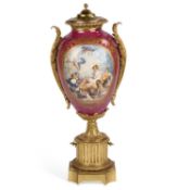 A LARGE FRENCH SÈVRES-STYLE PORCELAIN AND GILT METAL-MOUNTED COVERED VASE