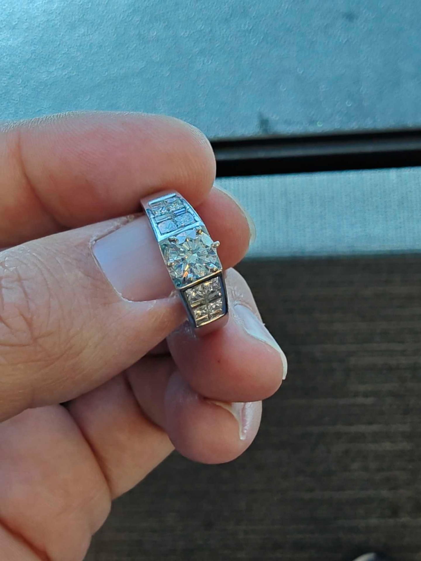 14kt white gold engagement ring, size .75 carat with 8 princess and 8 baguette side cuts with apprai - Image 8 of 11