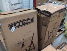 two boxes of lifetime folding chairs for turkey day