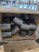 Crate of metal filter baskets