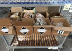 shelf of miscellaneous rounds of ammunition, shotgun shells, AR, and more