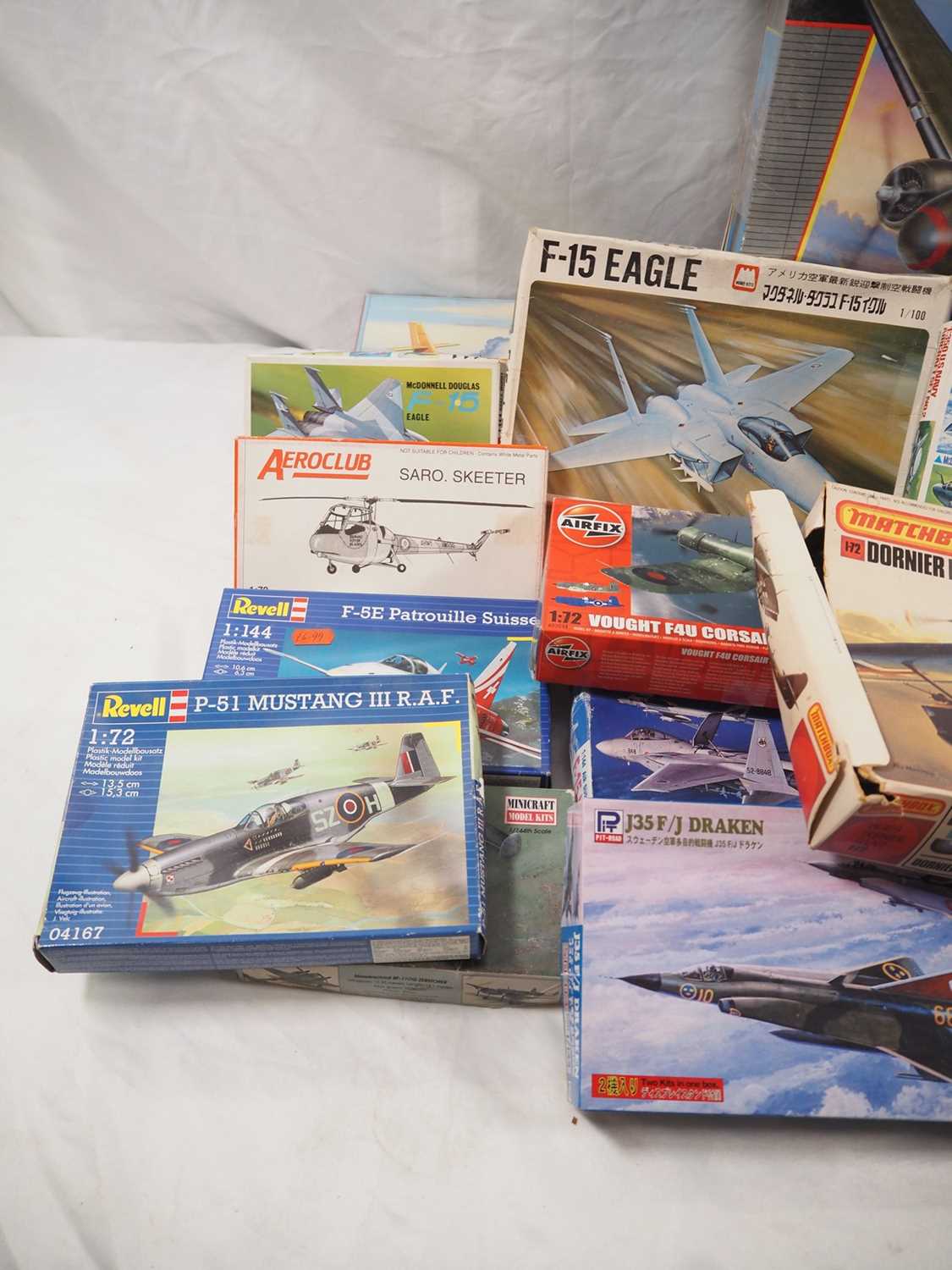 A large quantity of boxed plastic model kits, mostly military aircraft ...