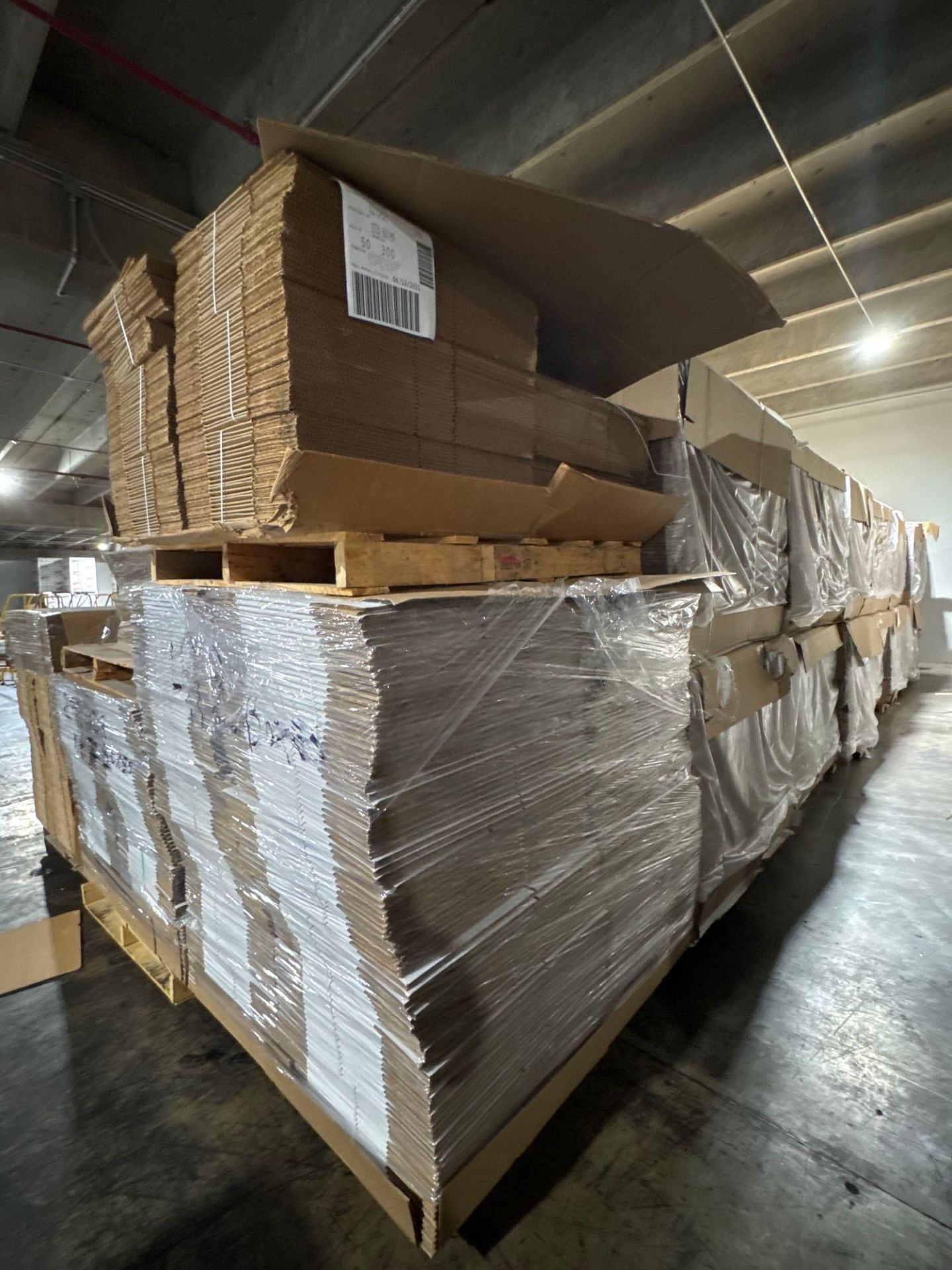Large lot of unmarked boxes. 24 Double Stacked Pallets. Approx 14,000 ...