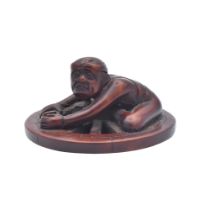 MIWA (ACTIVE LATE 18TH/EARLY 19TH CENTURY) A WOOD NETSUKE OF A CARPENTER, EDO PERIOD DATED 1784