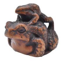 MASANAO OF YAMADA, ISE PROVINCE A WOOD NETSUKE OF TWO FROGS, EDO PERIOD (1615-1868)