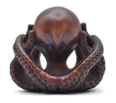 A WOOD NETSUKE OF AN OCTOPUS, EDO PERIOD (1615-1868), EARLY 19TH CENTURY