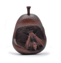 SANGETSU OF NAGOYAA WOOD NETSUKE OF A WASP INSIDE A ROTTEN NASHI PEAR, EDO PERIOD (1615-1868)