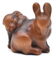 MASANAO OF YAMADA, ISE PROVINCEA WOOD NETSUKE OF TWO PIEBALD RABBITS, EDO PERIOD (1615-1868)