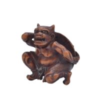 A WOOD NETSUKE OF ONI (DEMON), EDO PERIOD (1615-1868), 19TH CENTURY