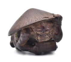 HAMANO MASAYUKI (SHOZUI)A WOOD NETSUKE OF AN ONI (DEMON), EDO PERIOD (1615-1868)