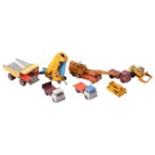 Eight assorted die-cast construction vehicles, Dinky and Matchbox
