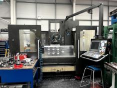 Nicolas Correa Prisma 20 4-axis bed type milling machine with bed-mounted outfeed swarf conveyor,
