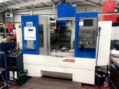 Huron CX10 vertical milling machine, Serial No. 00A410 (2000) with external swarf conveyor, metal