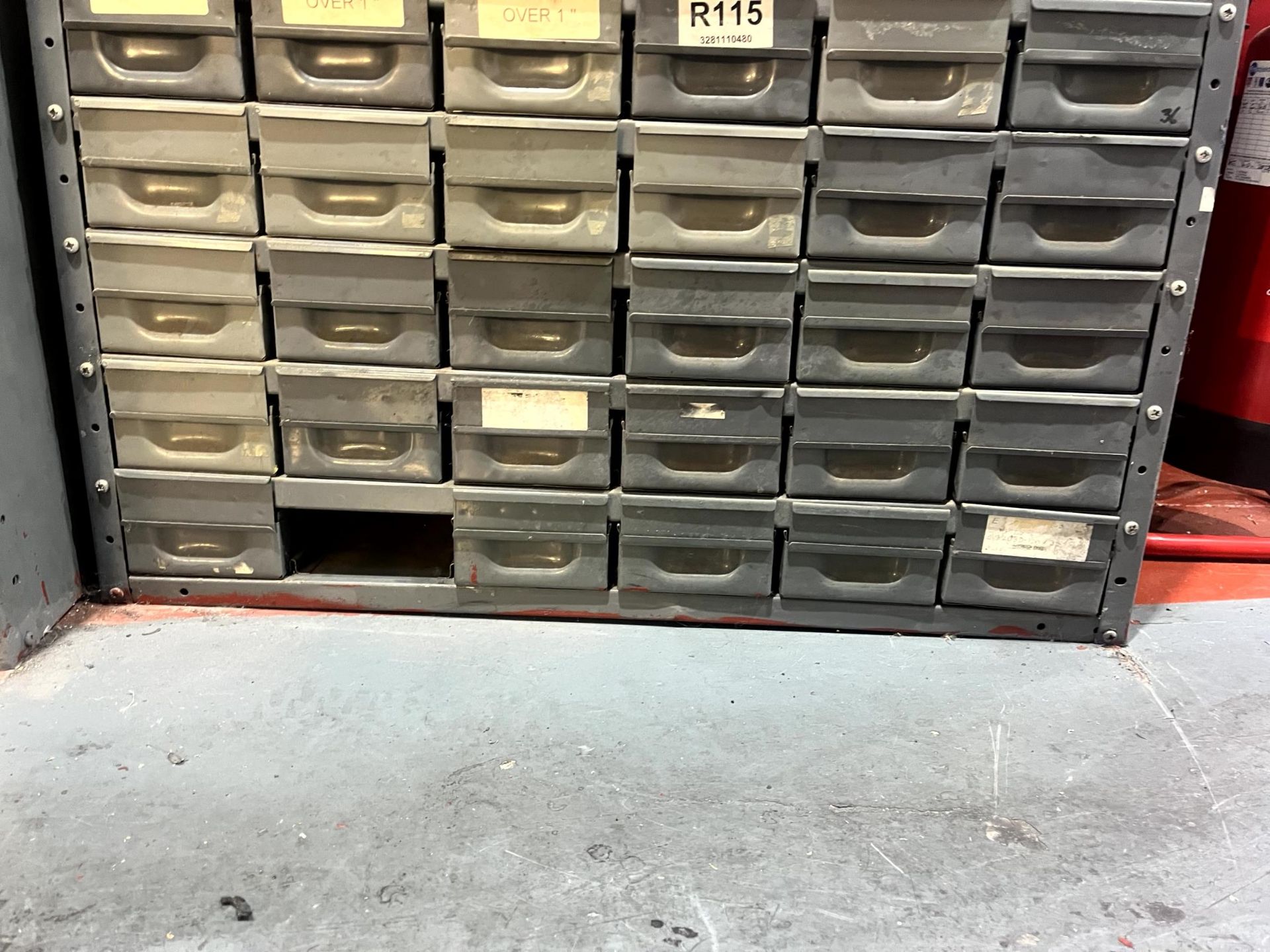 Two multi-drawer storage units with consumable contents and various ...