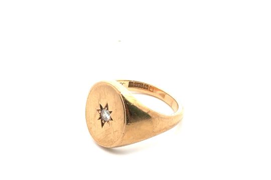 A gypsy set diamond oval signet ring mounted in 9ct gold. Diamond approx 0.1ct. Size R. - Image 3 of 3