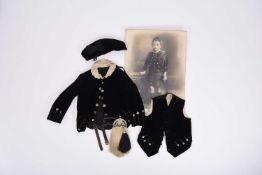 A Victorian child's black velvet jacket and waistcoat