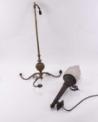 A bronze alloy torch wall light and a brass pendant chandelier
