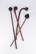 Four African tribal Maasai hardwood throwing clubs