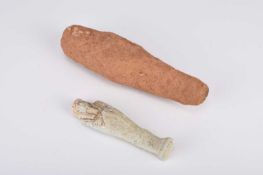 An Egyptian faience shabti and another larger shabti
