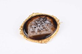 A late 19th century oval hardstone brooch / A small collection of jewellery