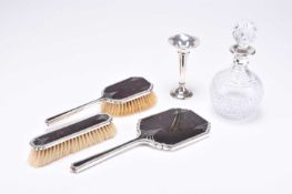 A small collection of silver