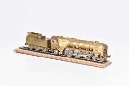 A brass kit built OO gauge locomotive and tender, with track stand