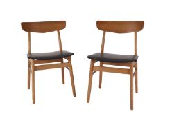A pair of Danish style mid-century dining chairs with black leatherette seats
