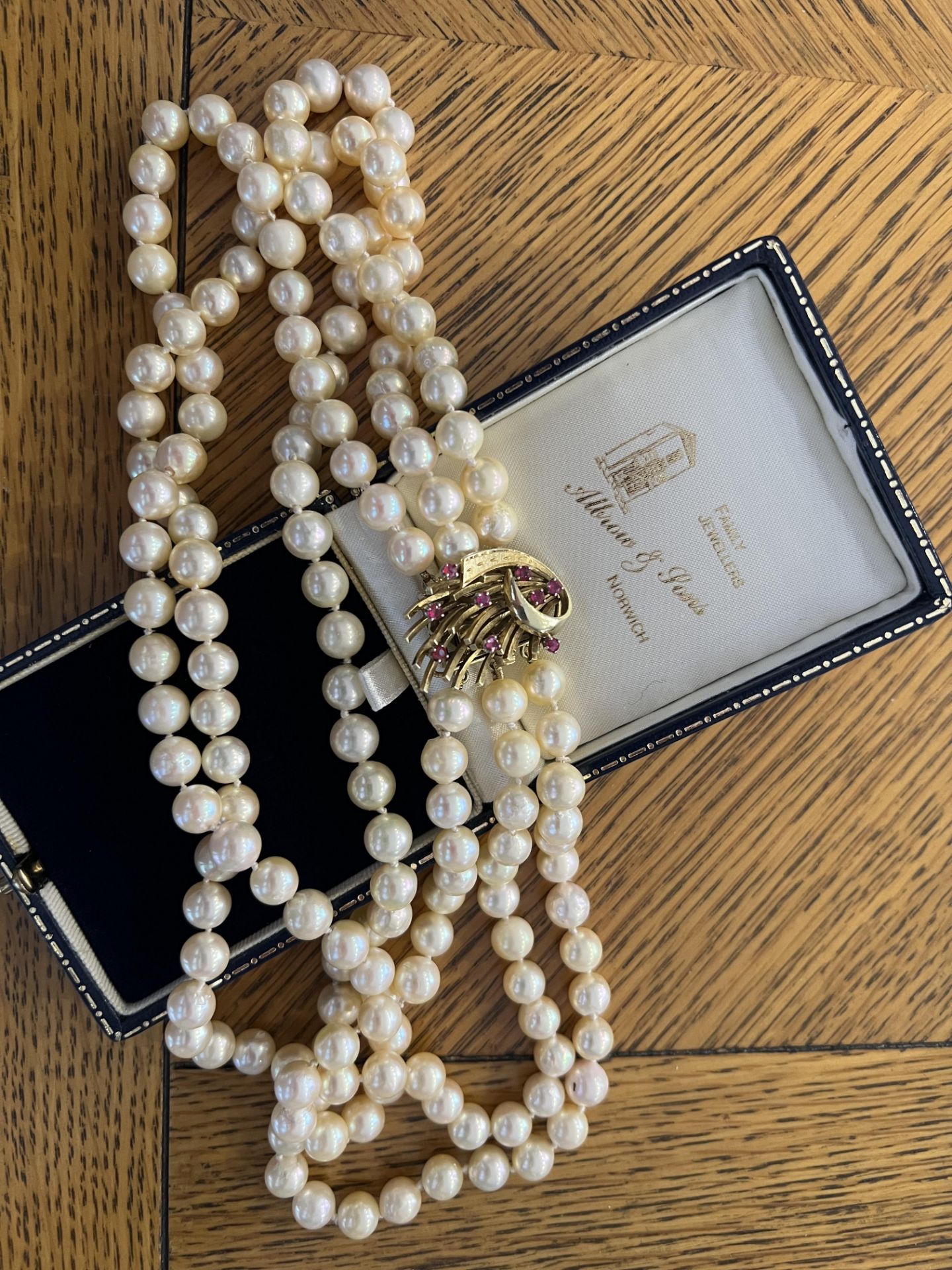 CULTURED PEARL NECKLACE WITH RUBY SET CLASP PEARLS ARE CULTURED - SIZE OF PEARLS APPROX. 7-8MM EACH 