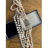 CULTURED PEARL NECKLACE WITH DIAMOND SET CLASP PEARLS ARE CULTURED - SIZE OF PEARLS - GRADUATED: APP