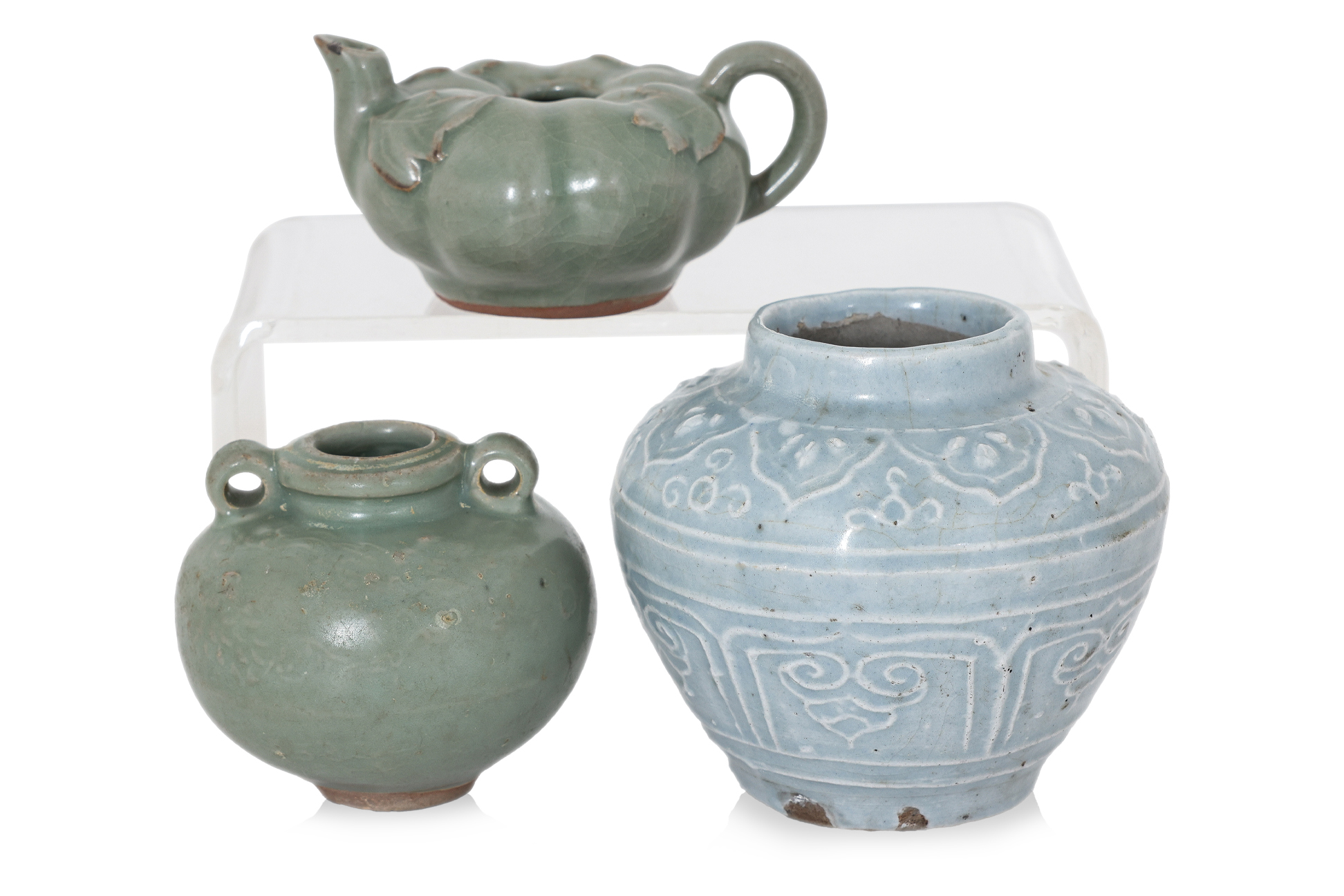 A CELADON JARLET, A SMALL TEAPOT AND PALE BLUE JAR