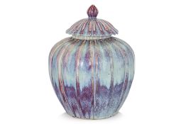 A LARGE FLAMBE JAR AND COVER