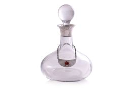 A SILVER MOUNTED CRYSTAL DECANTER