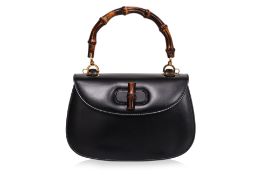 A GUCCI MEDIUM BAMBOO TOP HANDLE BAG
