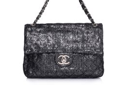 A CHANEL JUMBO BLACK QUILTED MESH FLAP BAG
