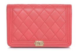 A CHANEL QUILTED CORAL BOY WALLET ON CHAIN