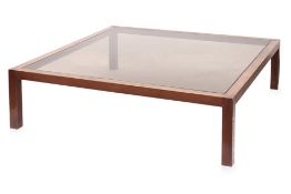 A MID-CENTURY TEAK AND BLACK GLASS COFFEE TABLE BY KERRY HILL