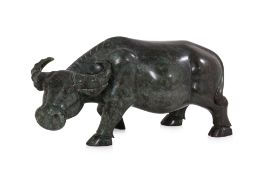 A VERY LARGE JADE CARVING OF A BUFFALO