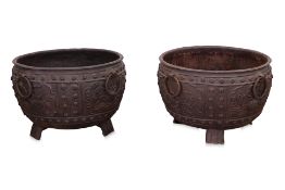 A PAIR OF MONUMENTAL CAST IRON CAULDRONS