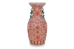 A LARGE IRON RED 'LOTUS AND SHOU' BALUSTER VASE