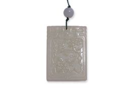 A RECTANGULAR CELADON JADE PLAQUE