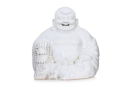 A LARGE BLANC DE CHINE PORCELAIN MODEL OF BUDAI