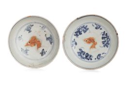 TWO SIMILAR BLUE AND WHITE BISCUIT DECORATED FISH DISHES