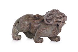 A LARGE JADE CARVING OF A MYTHICAL BEAST