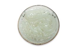 A RETICULATED JADE DRAGON CARVING SET IN GOLD