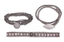 A GROUP OF THREE SILVER BELTS