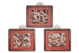 THREE SIMILAR CARVED AND PIERCED GILT WOOD PANELS