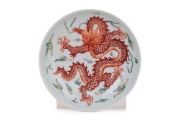 AN IRON RED DRAGON DECORATED DISH