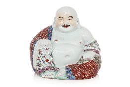 A FAMILLE ROSE PORCELAIN MODEL OF BUDAI