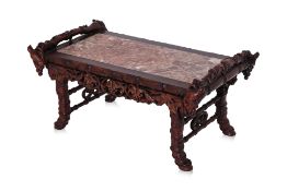 A MARBLE INSET CARVED HARDWOOD STAND